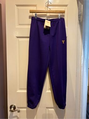 Nike Kids Purple Sweatpants with Gold Logo